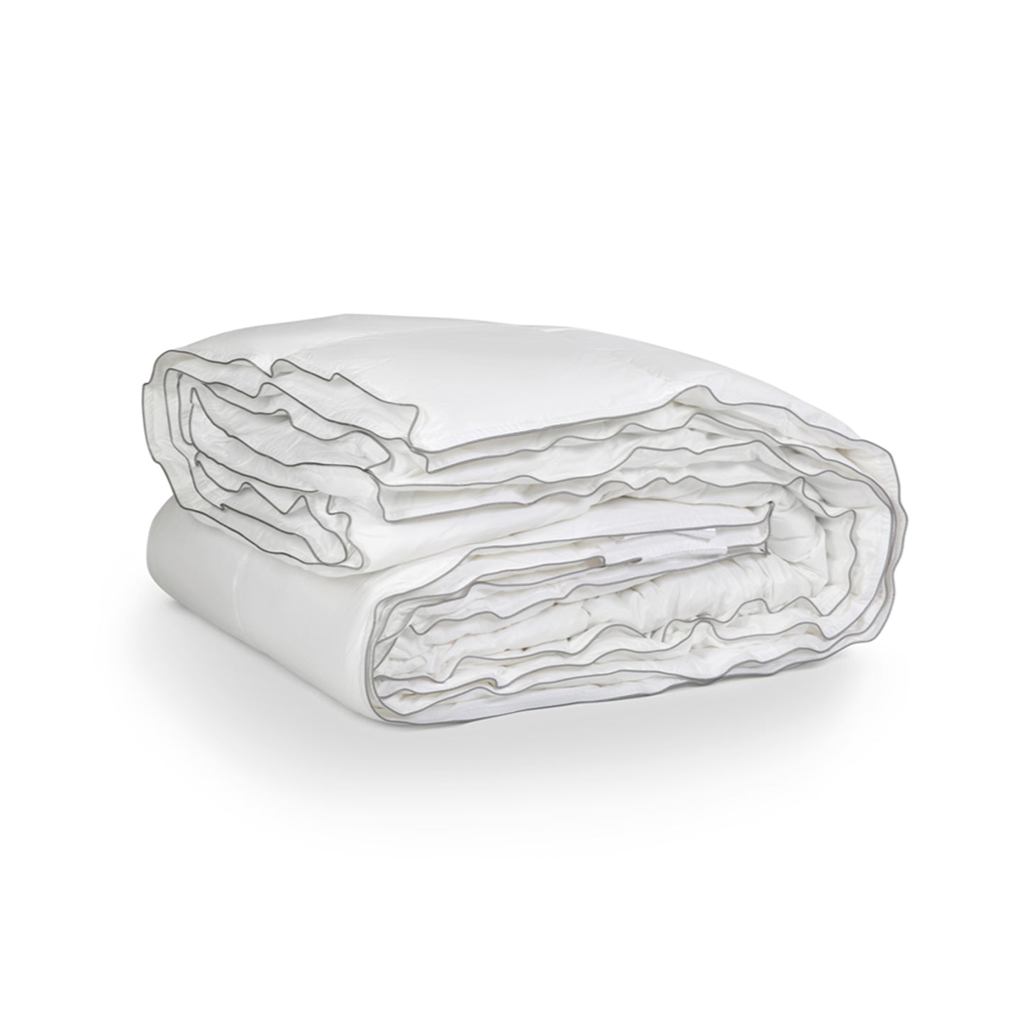 A folded white duvet cover made of percale cotton, showing the texture and color of the fabric.